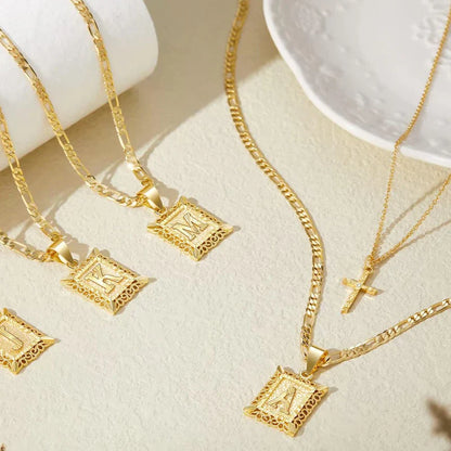 Set Collana Croce con Iniziale | Oro